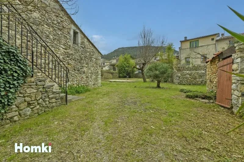 Immeuble en monopropriété T7 165m²avec terrain, garages et dépendances sur Saint-Hippolyte-du-Fort - Photo 1