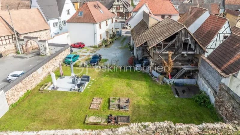 Terrain constructible et immeuble de rapport - Photo 1