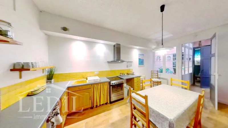 Immeuble avec un commerce loué et 2 appartements - Photo 1