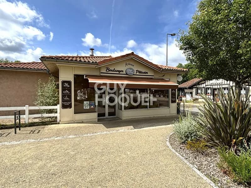 Bel ensemble immobilier au coeur de Saint Julien en Born - Photo 1