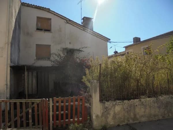 Ensemble immobilier avec 2 maisons, garage et jardin - Photo 1