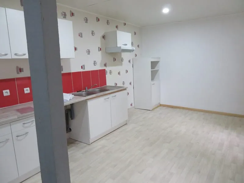 Immeuble de 4 logements, un local commercial et un garage en - Photo 1