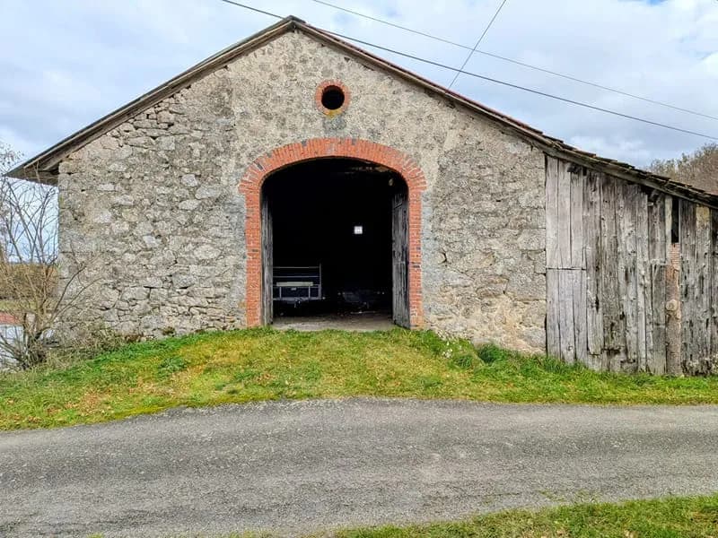 Grange de 145 x 2 niveaux - Photo 1