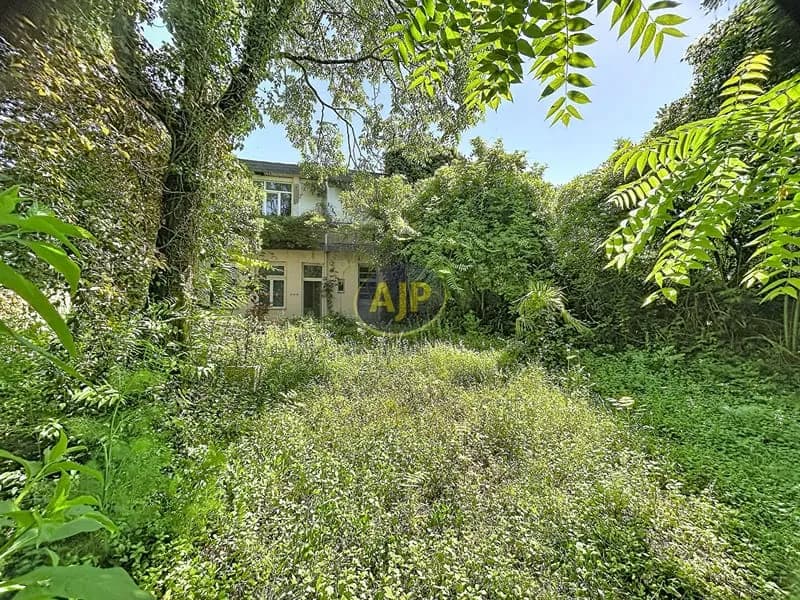 Immeuble en pierre avec jardin - Photo 1