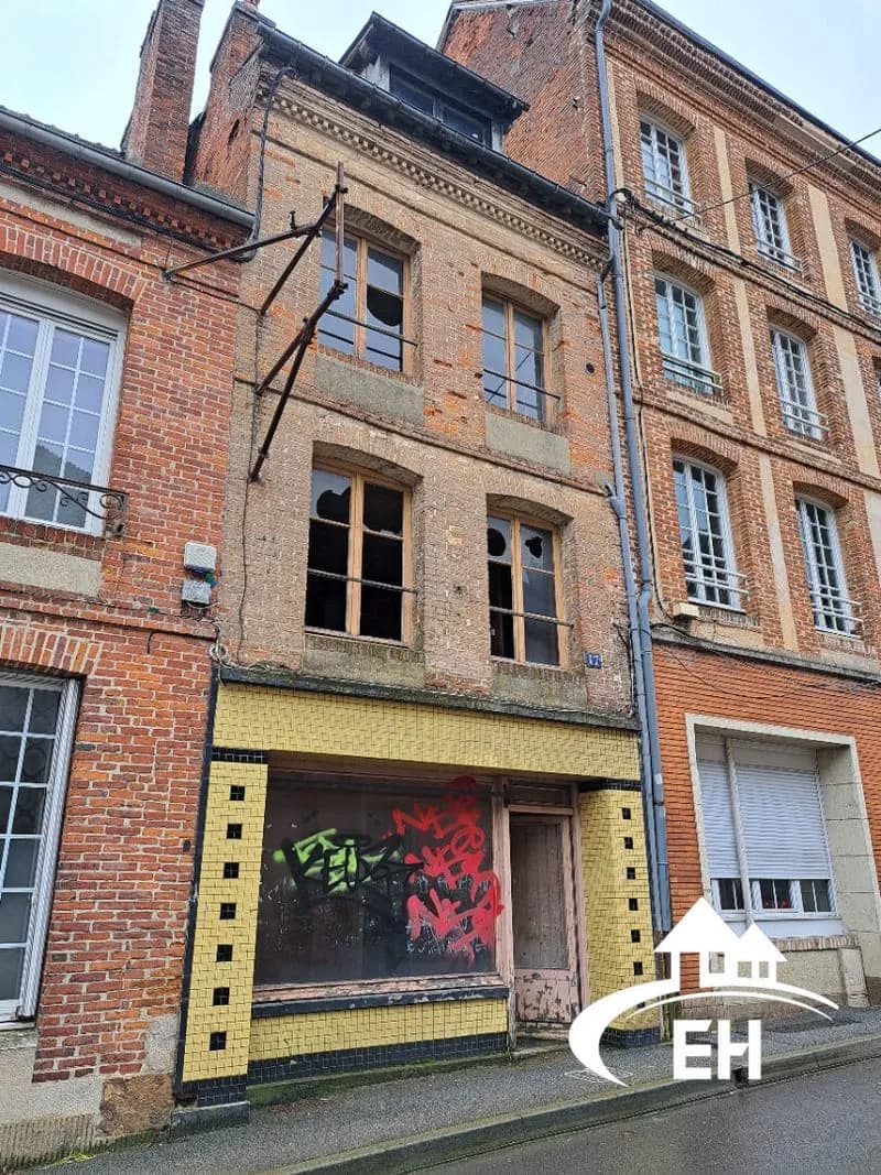 IMMEUBLE CENTRE L'AIGLE - Photo 1