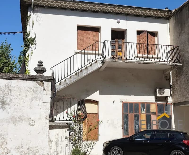 IMMEUBLE AVEC HABITATION ET GARAGE A RENOVER - Photo 1