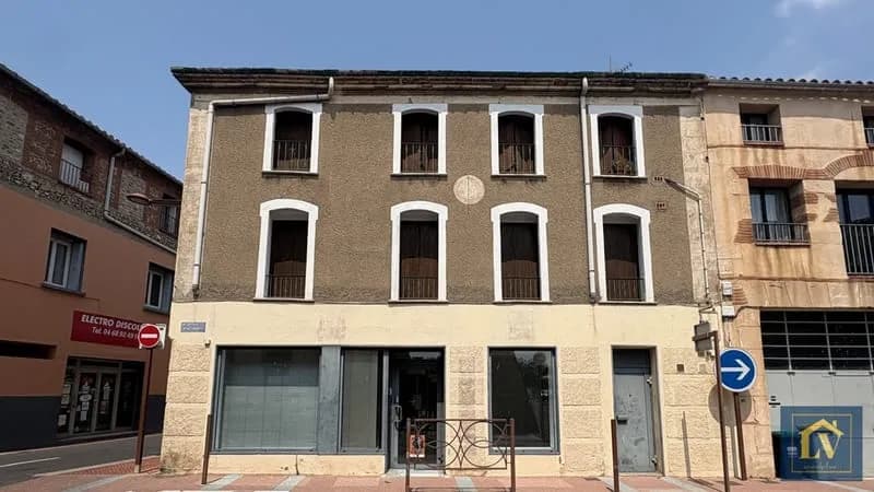 Immeuble de rapport comprenant un local commercial et 4 appartements - Photo 1