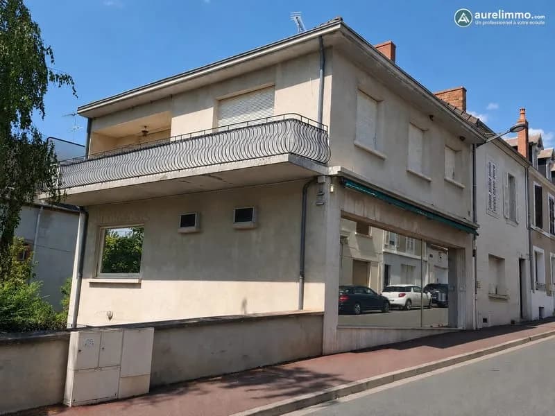 Immeuble de rapport comprenant local, appartements, garages - Photo 1
