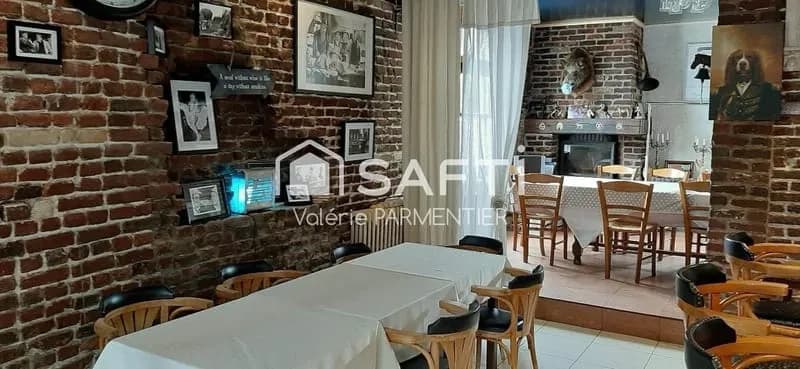 Immeuble mixte avec restaurant exploité, logement indépendant et fort potentiel de développement - Photo 1