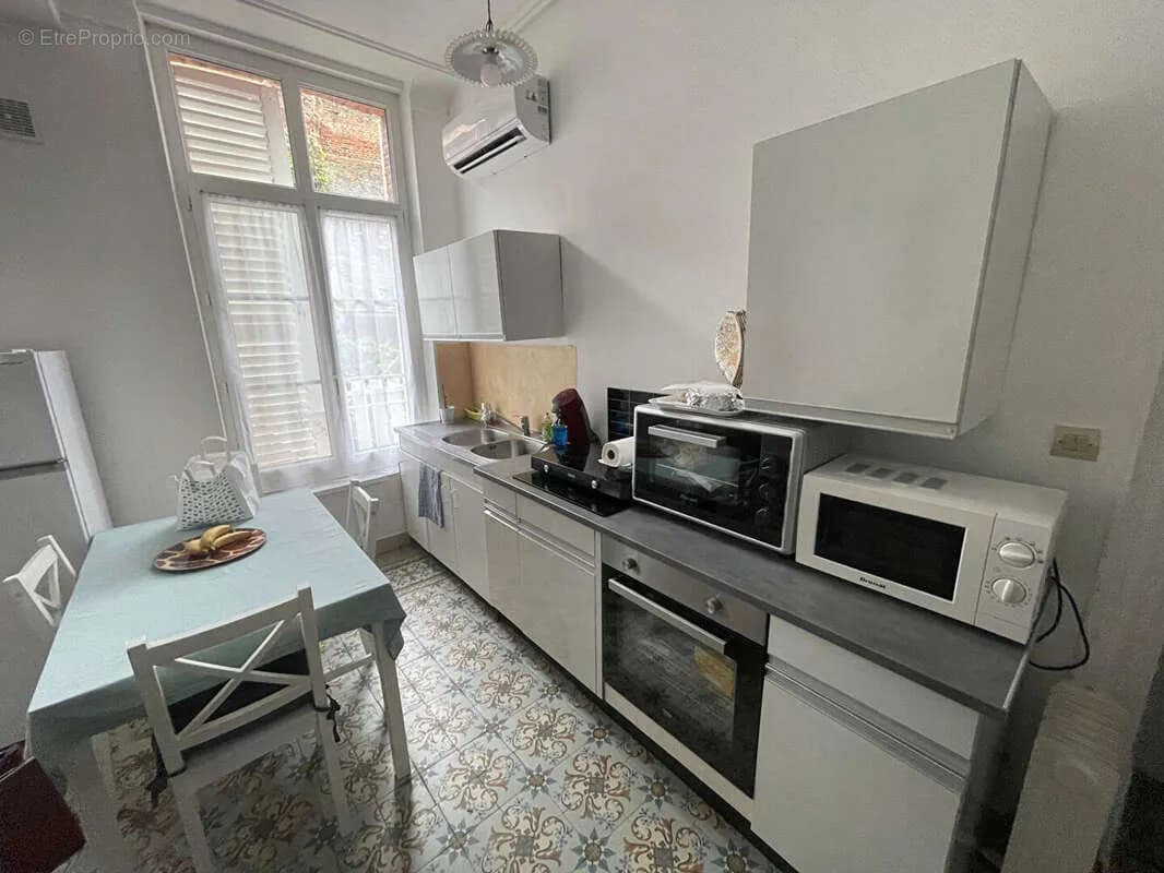 Immeuble 7 appartements-CENTRE VILLE GUISE - Photo 1