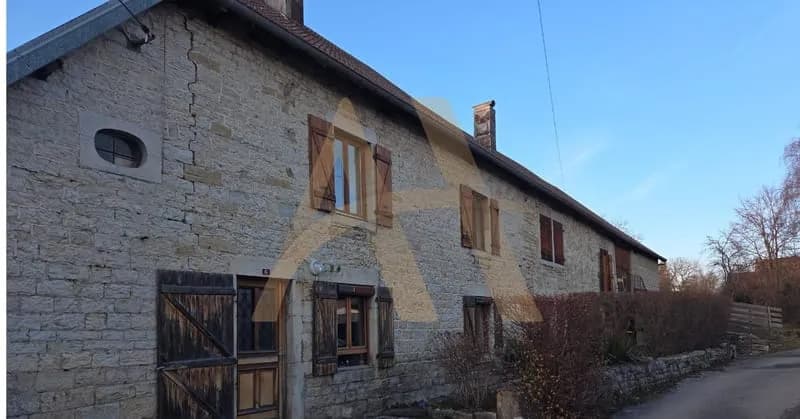 Un ensemble immobilier composé de deux appartements et une grange - Photo 1