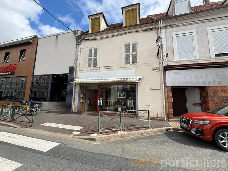 Immeuble avec local commercial et appartement duplex - Photo 1