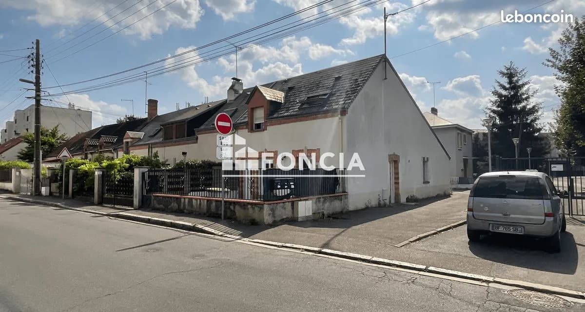Ensemble immobilier de 3 appartements et de 3 stationnements - Photo 1