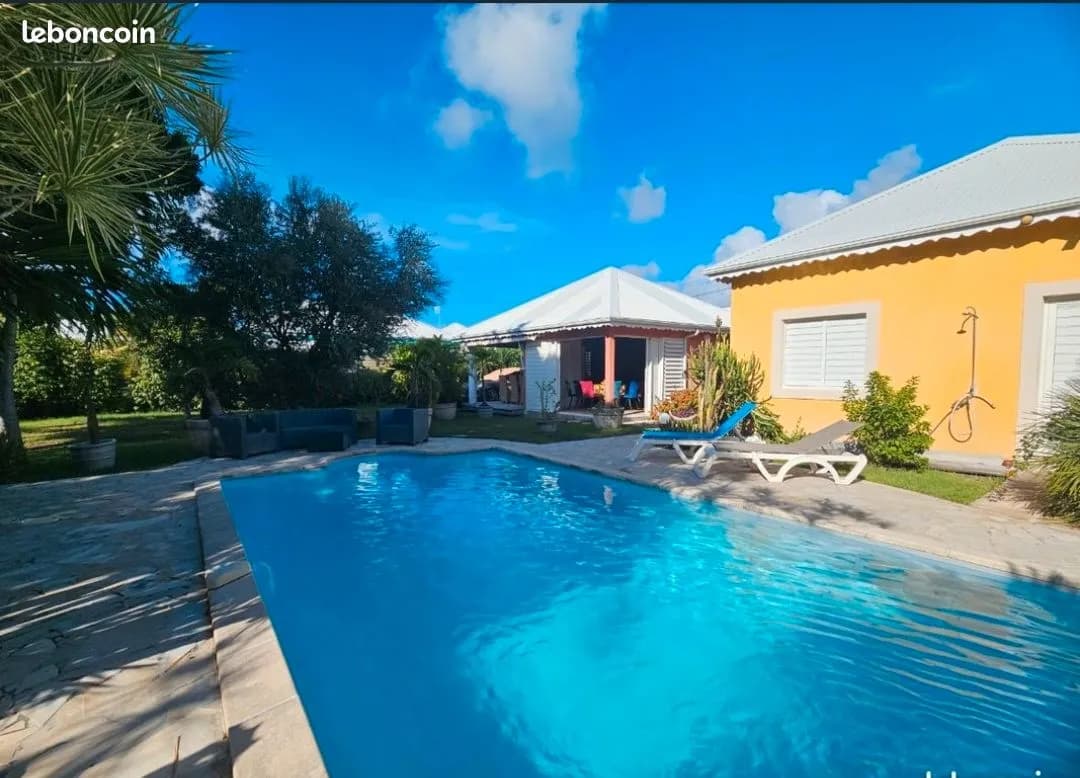 Ensemble immobilier exceptionnel - 3 maisons - 1500 m² de terrain arboré tropicalisé - piscine - À 100 m du lagon - Photo 1