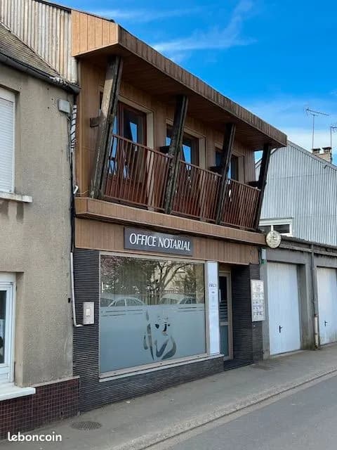 Immeuble/maison de ville comprenant appartement + local commercial loué + jardin+garage+cave - Photo 1