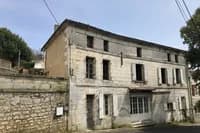 Immeuble comprenant une maison et un appartement situé entre ville et campagne - Photo 1