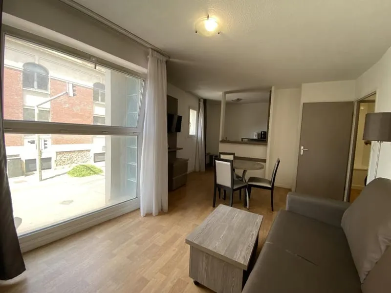 7 appartements (3 studios, 2 T1 et 2 T2) + 4 parkings - Photo 1