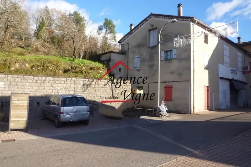 Immeuble commercial et d'habitation - Photo 1