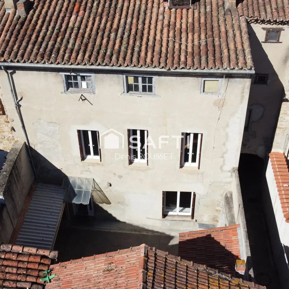 Ensemble immobilier composé d'une maison de 150m², d'un local commercial de 40m², cour et grand garage de 110m². - Photo 1