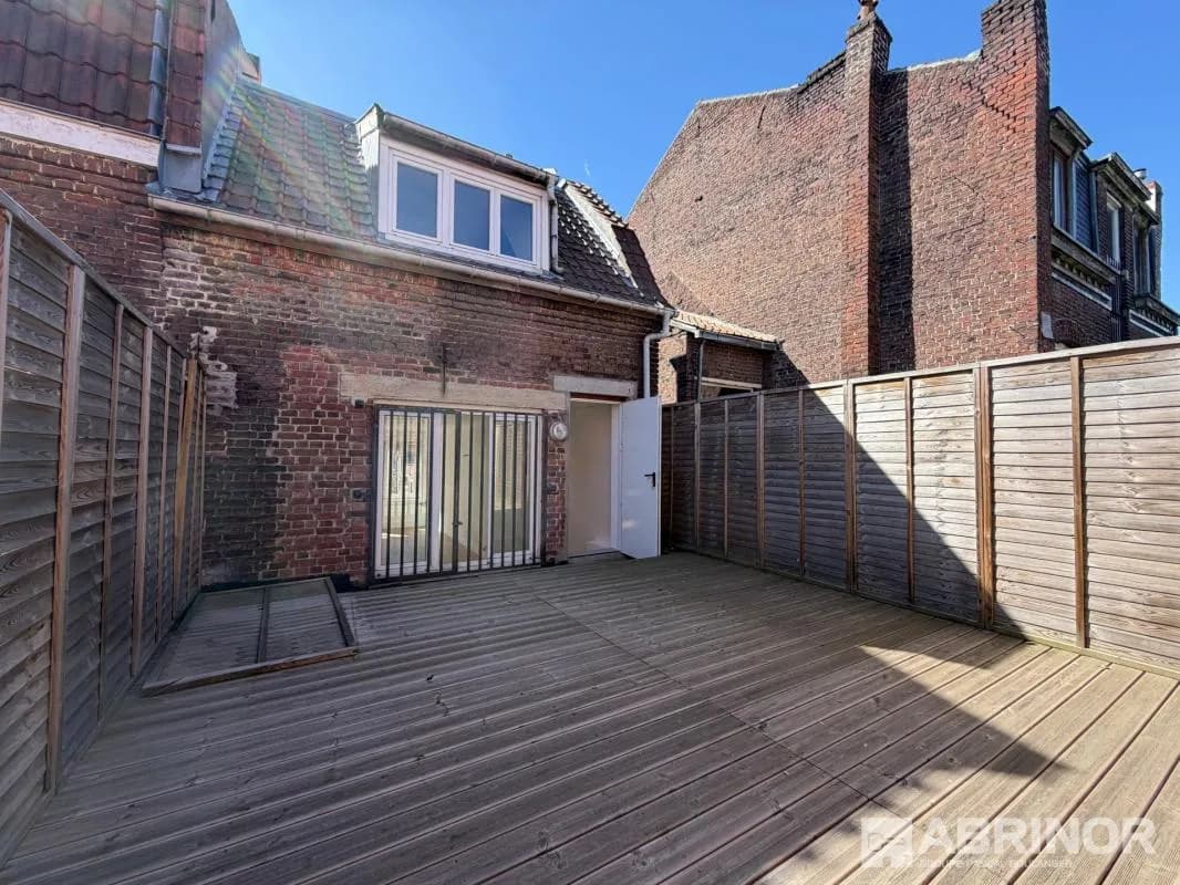 Immeuble de rapport idéalement situé rue principale à Loos opportunité rare ! - Photo 1