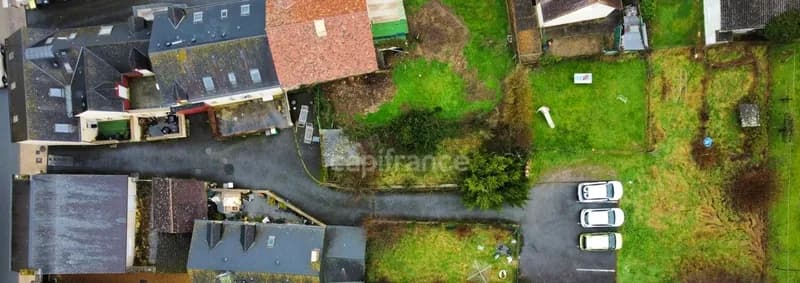 ENSEMBLE DE 6 LOGEMENTS LOCATIFS - REVENUS DE 43080€ / AN - À 12 MINUTES DU MANS - Photo 1
