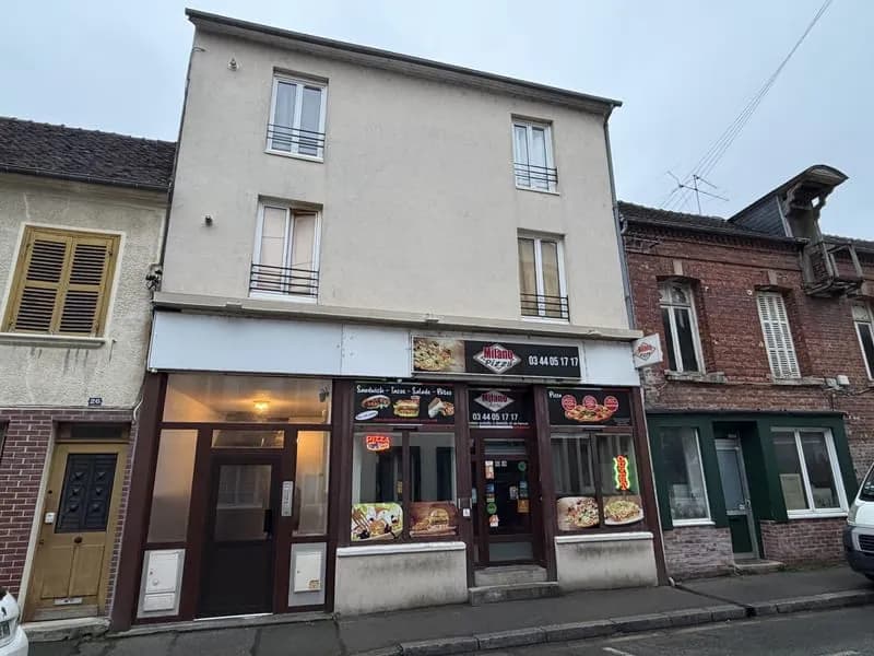 IMMEUBLE DE RAPPORT COMPRENANT 8 APPARTEMENTS ET UN LOCAL COMMERCIAL - Photo 1