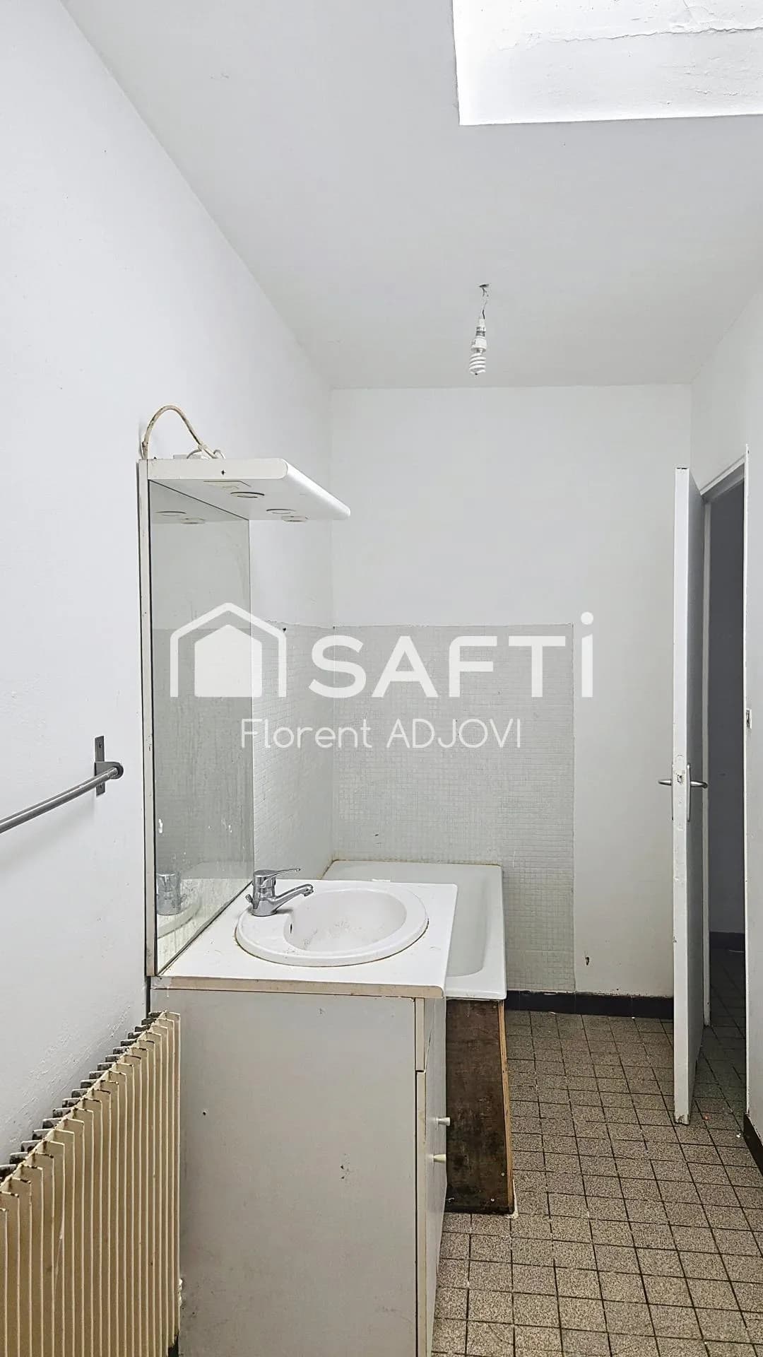 Votre prochain placement sécurisé: immeuble en centre ville avec locataires en place - Photo 1
