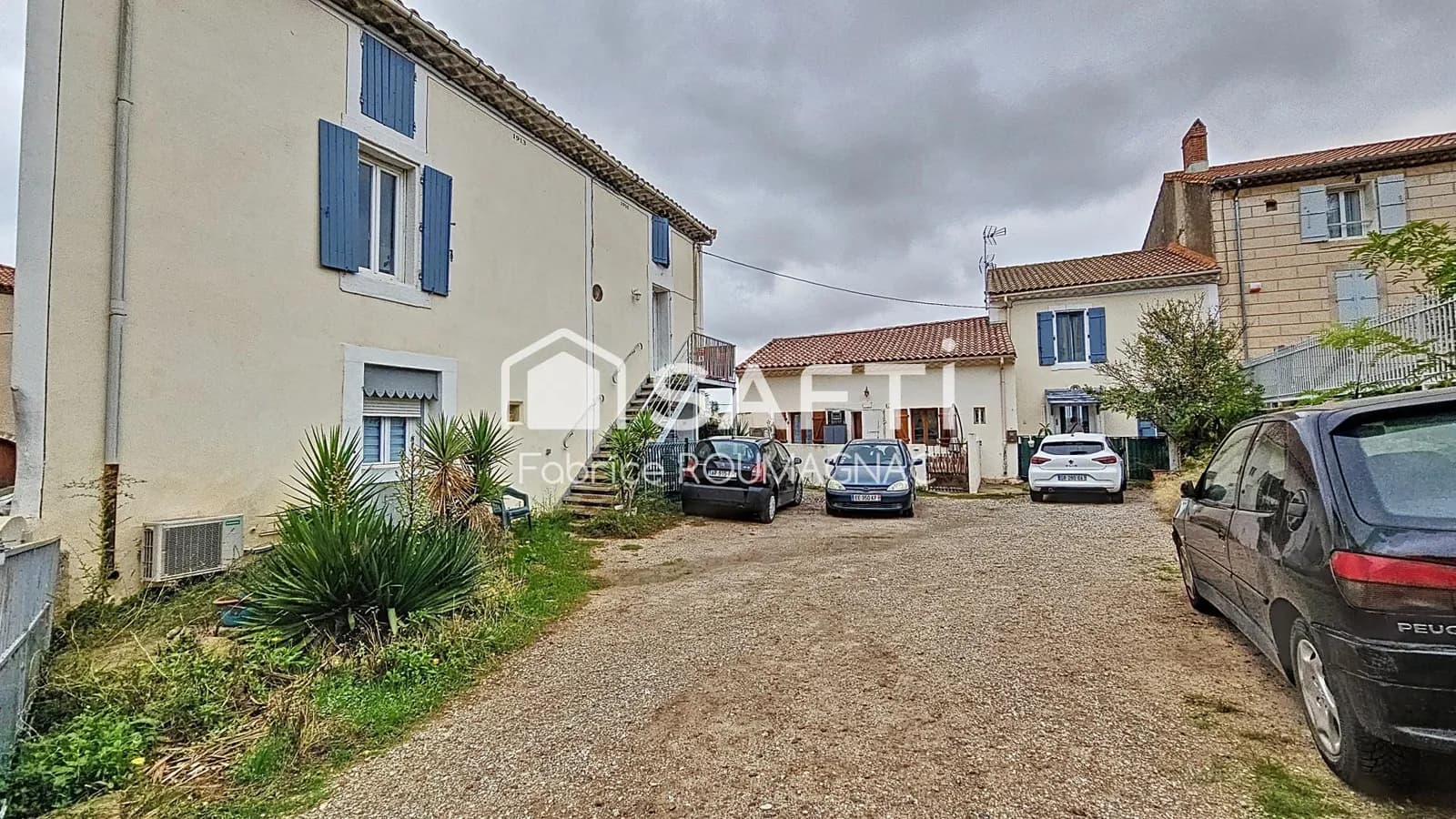 Ensemble immobilier de sept maison - Photo 1